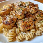 creamy garlic butter chicken and rotini in parmesan sauce
