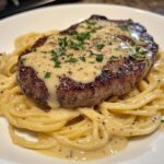 garlic butter steak with cheesy linguine in four cheese sauce
