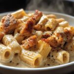 spicy cajun chicken rigatoni in creamy mozzarella alfredo