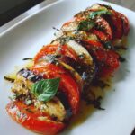 Aubergine met tomaat en basilicum