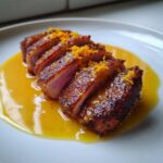 Gegrilde eendenborst met sinaasappeljus