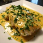 Witvis met kerrieroomsaus